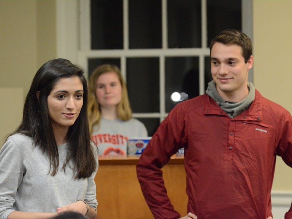 Maria Tahamtani, (left) a third-year College student and the president of BiHOOphilic at U.Va., and Daniel Brooks (right) a third-year College student and the vice president of BiHOOphilic at U.Va., spoke in support of their organization.&nbsp;