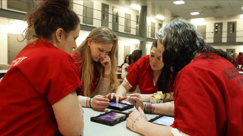 Professors launch new tablet-based modules intended to ease inmate reintegration back into society, decreasing reincarceration rates.