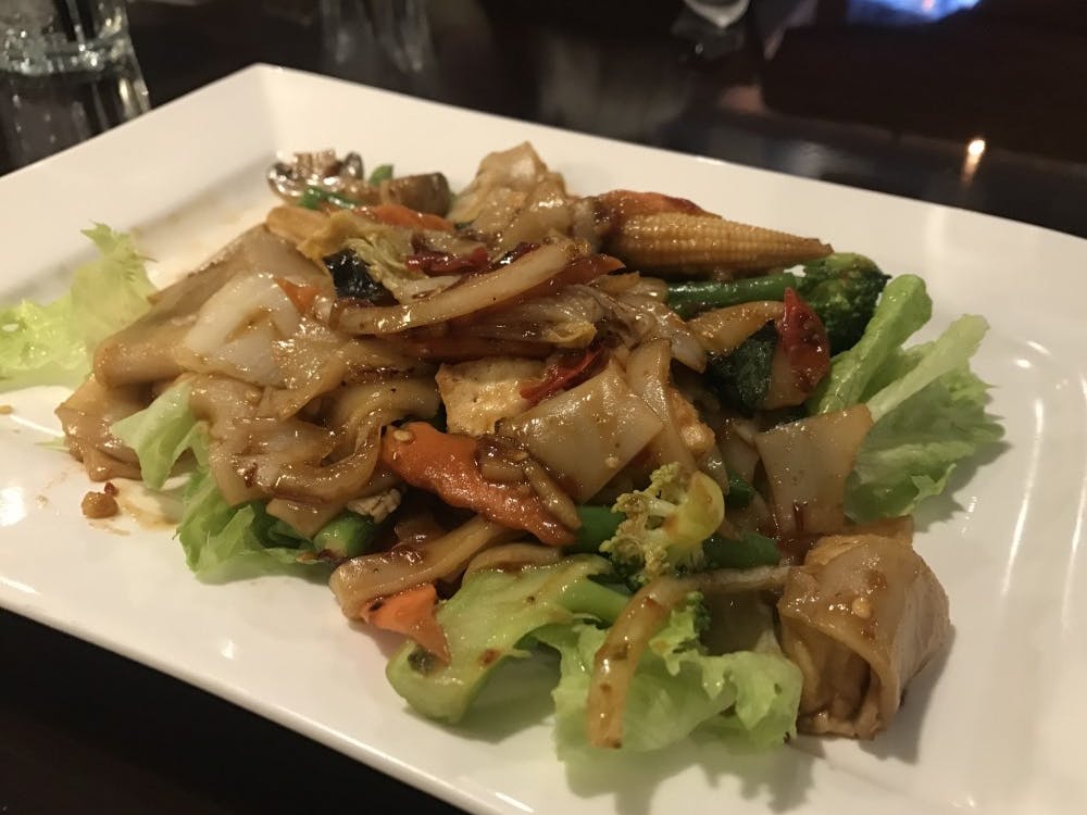 My plate arrived with a large pile of drunken noodles mixed with fresh vegetables. &nbsp;