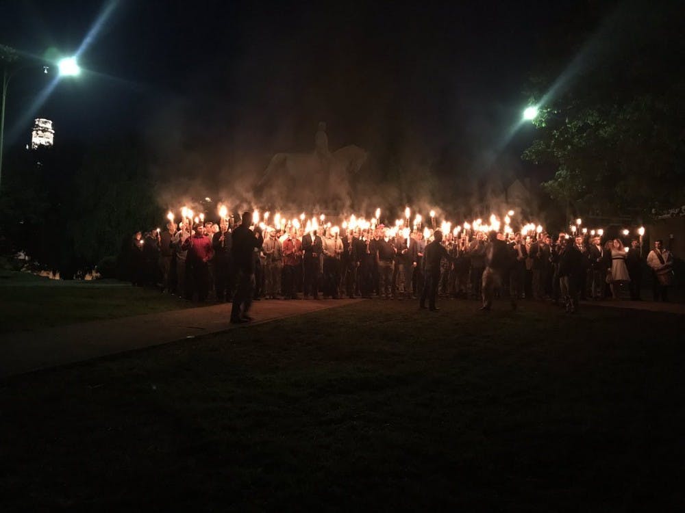 The torchlit demonstration was held in Lee Park Saturday evening and attracted the support of white nationalist&nbsp;"alt-right" leader Richard Spencer.