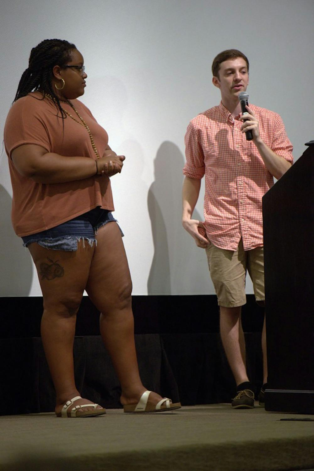 <p>Alex-Smith Scale and Garrison Grow speak at a Take Back the Night interest meeting Monday night.</p>