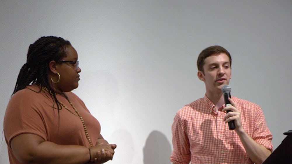 Alex-Smith Scale and Garrison Grow speak at a Take Back the Night interest meeting Monday night.
