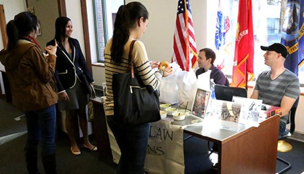 <p>Virginia Law Veterans hand out bagels to Law students for Veterans Day.&nbsp;</p>
