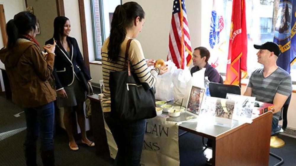 Virginia Law Veterans hand out bagels to Law students for Veterans Day.&nbsp;