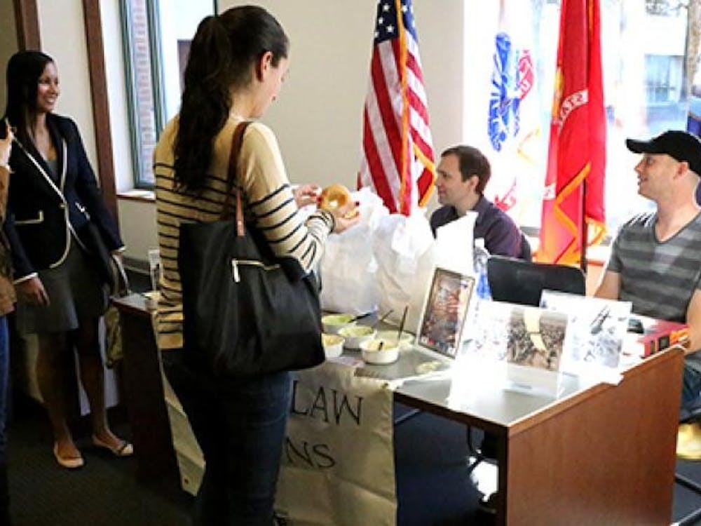 Virginia Law Veterans hand out bagels to Law students for Veterans Day. 