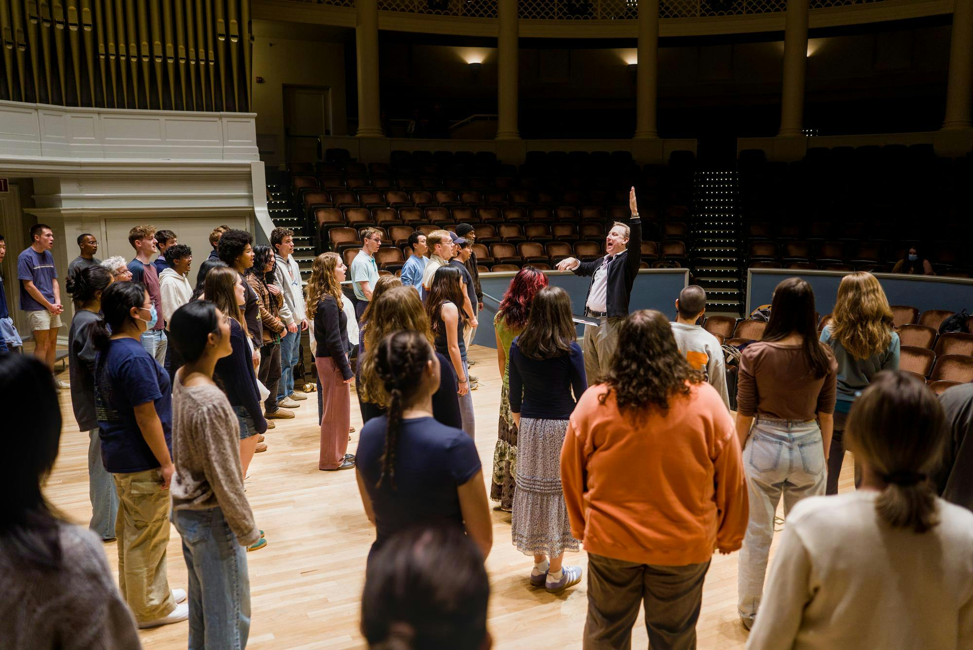 “Ten thousand voices sing thy acclaim” – a line from the oft-forgotten official alma mater of the University, "Virginia, Hail, All Hail." While not quite ten thousand, over a hundred voices worked hard in rehearsal to come together Friday evening in Old Cabell Hall for a performance worth acclaiming.
