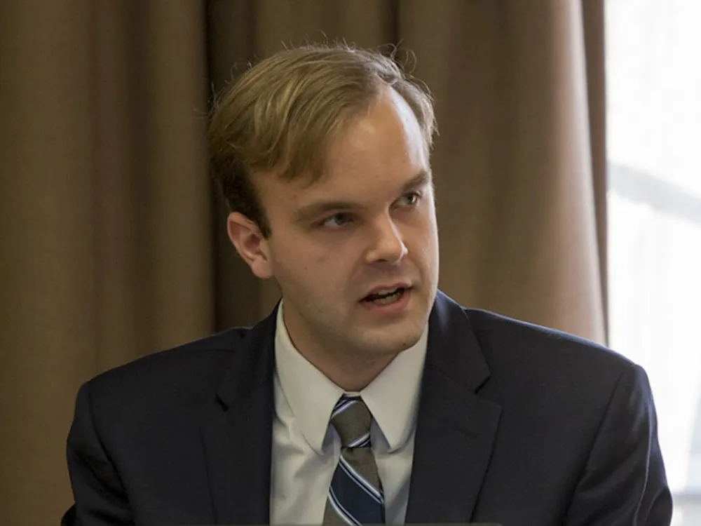 Peter Bautz, a third-year Law student and UJC chair, spoke on professionalism in the committee, quoting the bylaws to discuss how officers need to conduct themselves.