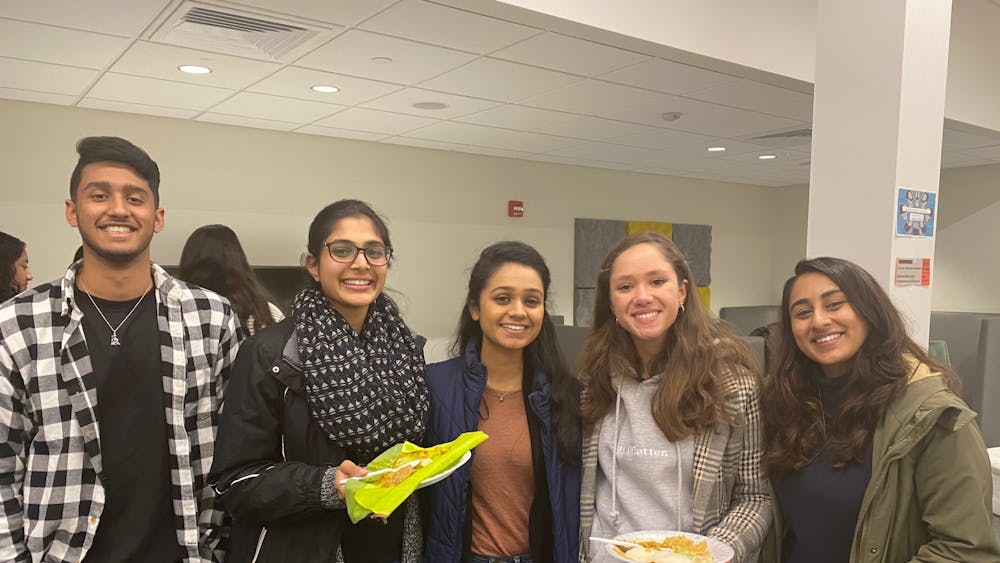 Students enjoy their traditional homemade South Indian cuisine in honor of Pongal.
