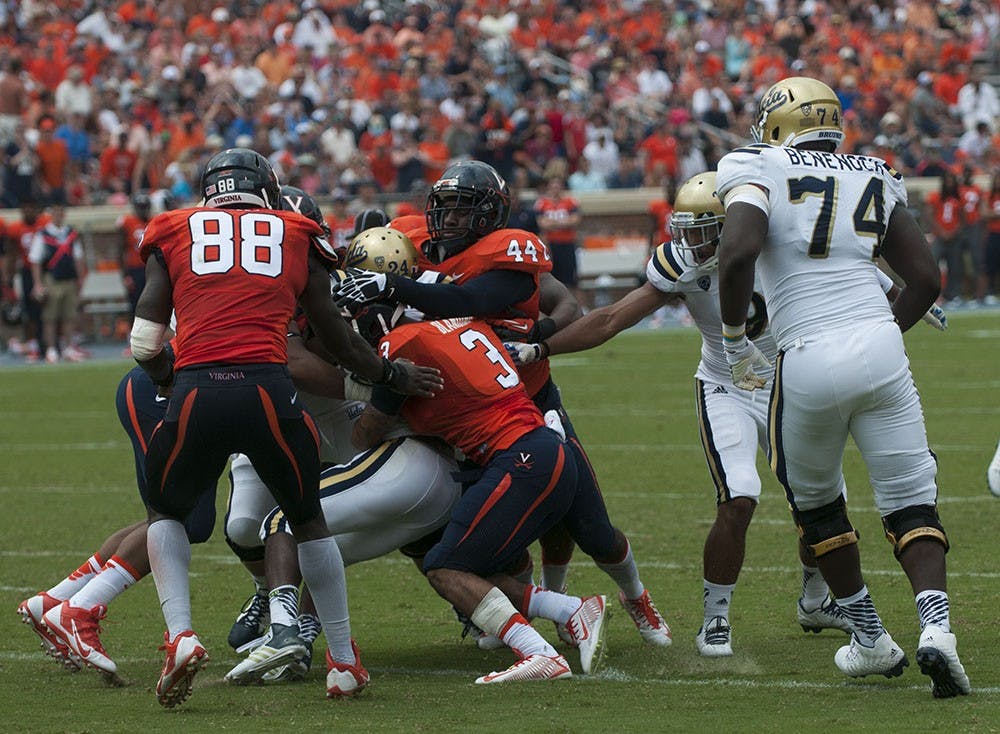 	Senior middle linebacker Henry Coley (no. 44) was all over the field Saturday. He led the Cavaliers with 14 tackles, including two sacks of UCLA quarterback Brett Hundley. 