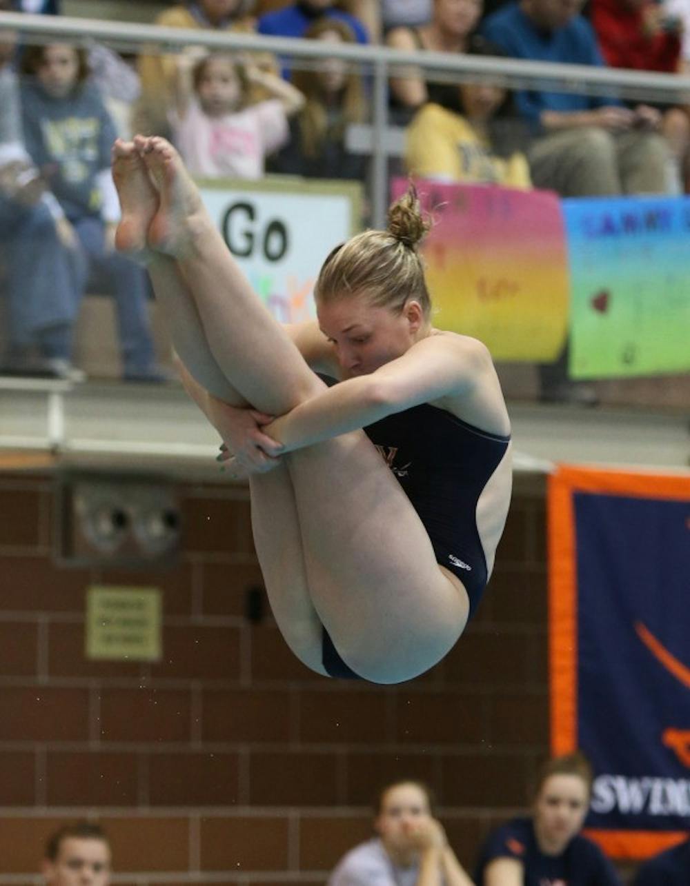 <p>Junior Becca Corbett broke teammate junior Katie Warburg's program record in the 3-meter diving competition against the Hokies, posting a score of 325.50. The women's team rolled to a 243-110 win. </p>
