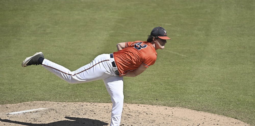 <p>Mike Vasil unloads from the mound.</p>