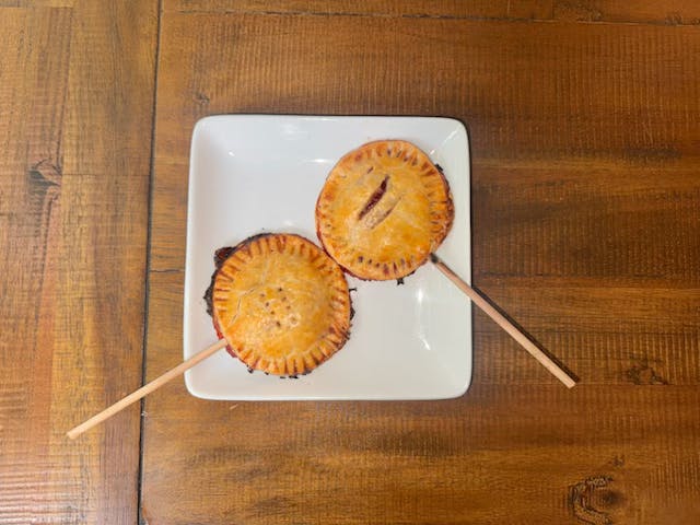 Neatly sealed at the edges and placed atop a wooden stick, pie pops serve up big, crowd-pleasing flavors with little mess