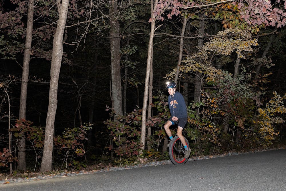 <p>Mason Allen pedals ahead during his 21-hour world-record attempt.</p>