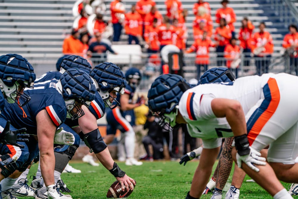 Virginia prepares for battle at the line of scrimmage.
