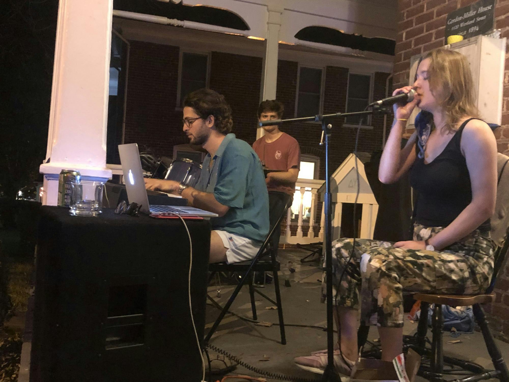 The Wertland Street Band performs on pianist Nikki Gerszten's front porch to a socially-distanced crowd.  