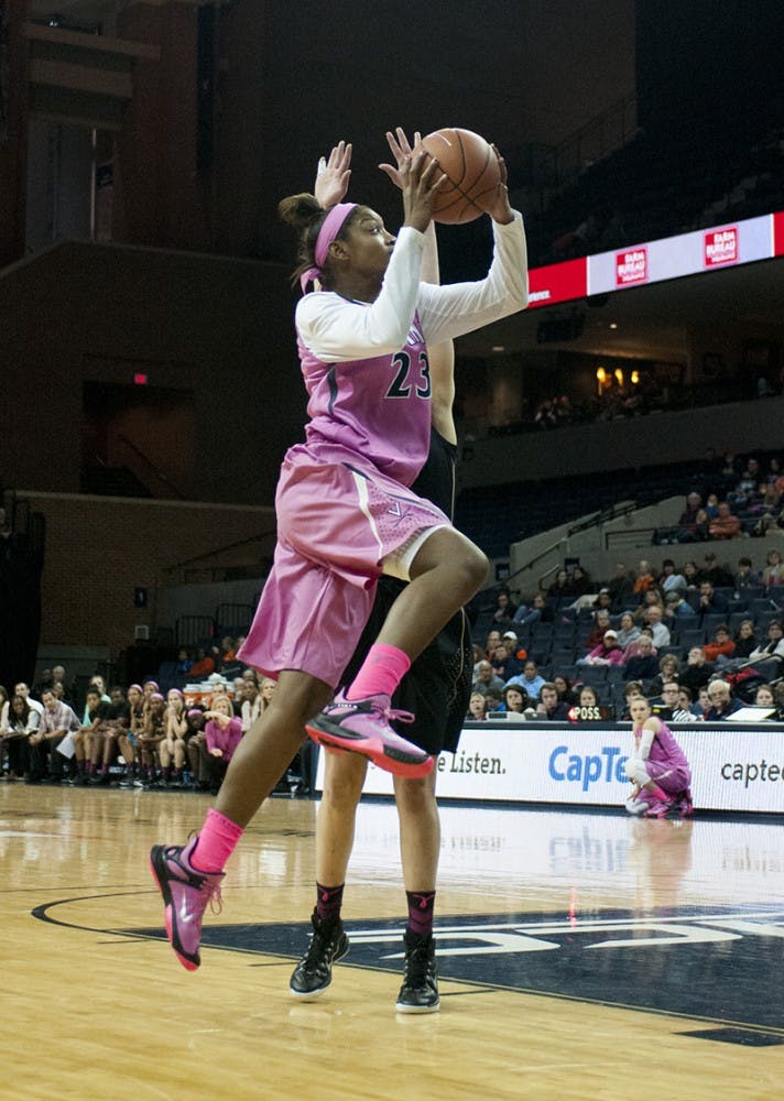 Freshman forward Aliyah Huland El scored 12 points in the second half, when the Seminoles locked up freshman guard Mikayla Venson. The Cavaliers wore pink jerseys, socks and sneakers in support of breast cancer awareness. 