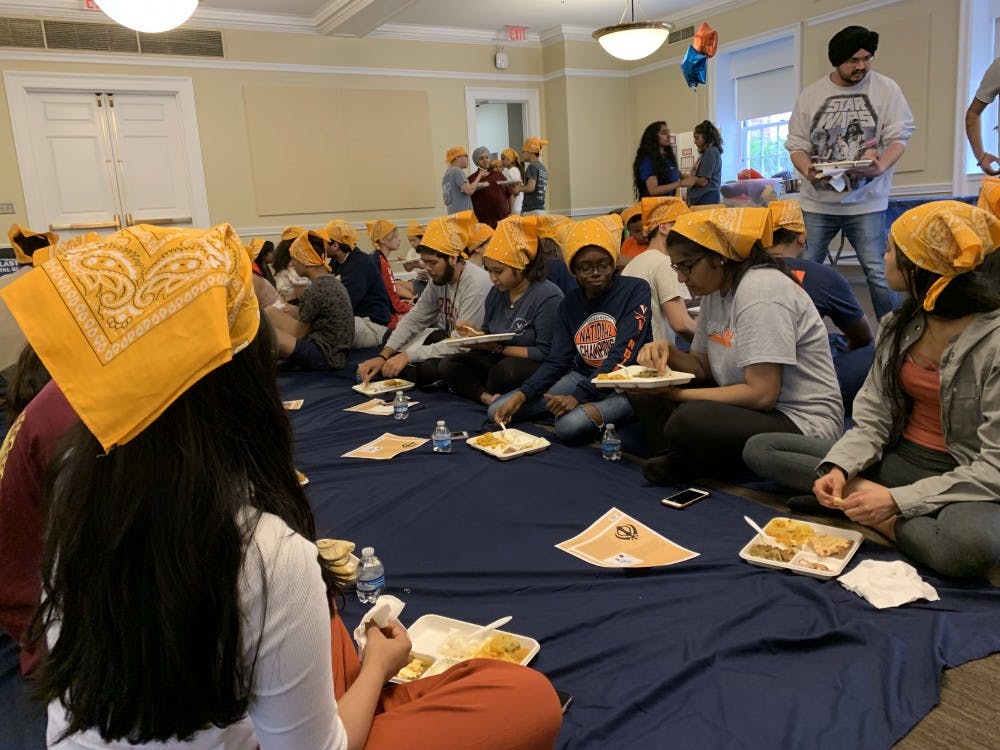 <p>During Langar, people of all classes, genders and religions are welcome and seated beside one another on the floor in a display of unity and equality.</p>