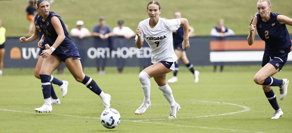 <p>Junior forward Meredith McDermott races to the ball against Notre Dame.</p>