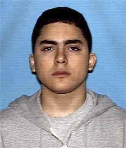 In this undated photo released by the Texas Department of Public Safety, Colton Joshua Tooley is shown. Tooley, wearing a dark suit and a ski mask, on Tuesday, Sept. 28, 2010 opened fire with an assault rifle on the University of Texas campus before fleeing into a library and fatally shooting himself. No one else was hurt. (AP Photo/Texas Department of Public Safety)