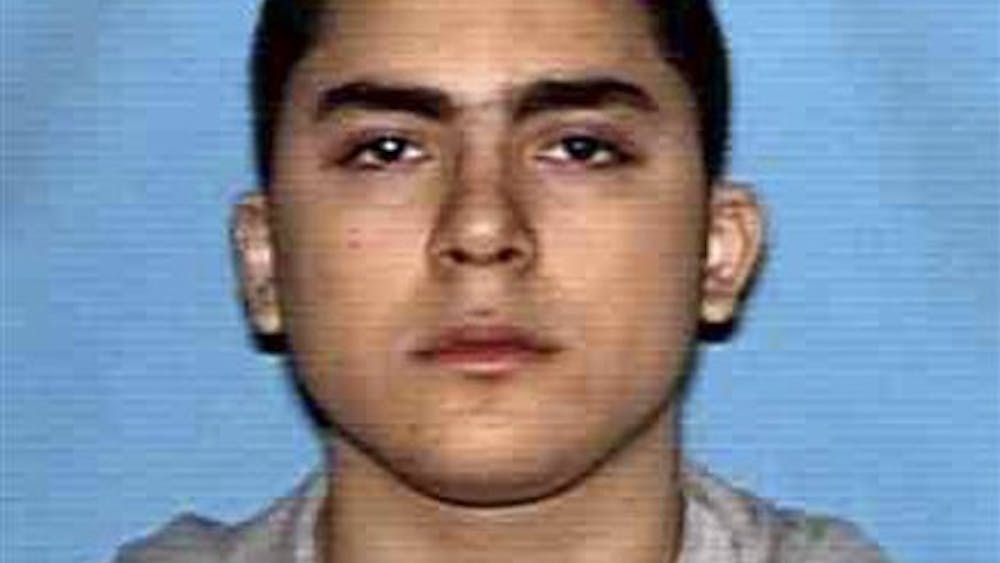 In this undated photo released by the Texas Department of Public Safety, Colton Joshua Tooley is shown. Tooley, wearing a dark suit and a ski mask, on Tuesday, Sept. 28, 2010 opened fire with an assault rifle on the University of Texas campus before fleeing into a library and fatally shooting himself. No one else was hurt. (AP Photo/Texas Department of Public Safety)