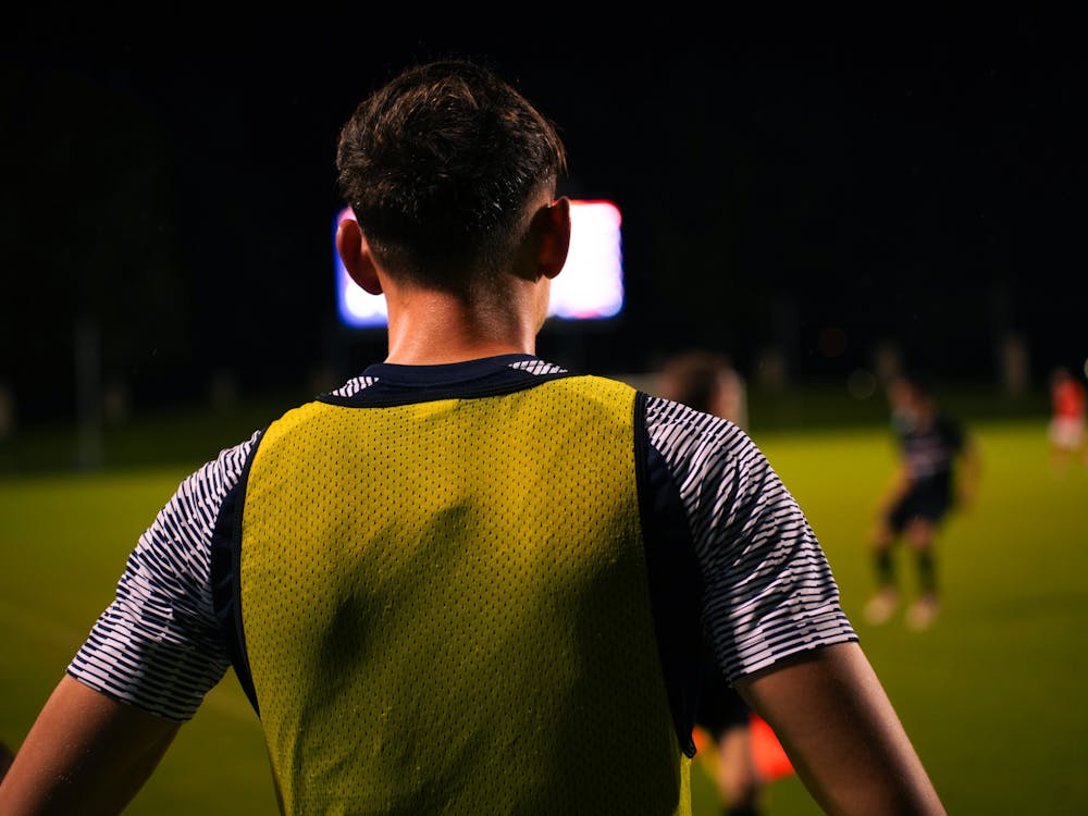 Joaquín Brizuela looks on from the sideline during Virginia's game against Stanford.