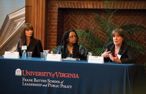 Edwards (center) speaking on a panel at the Frank Batten School of Leadership and Public Policy in April 2013.&nbsp;