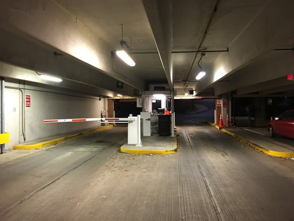 Human parking attendants frequently leave the Central Grounds Garage around 11 p.m.