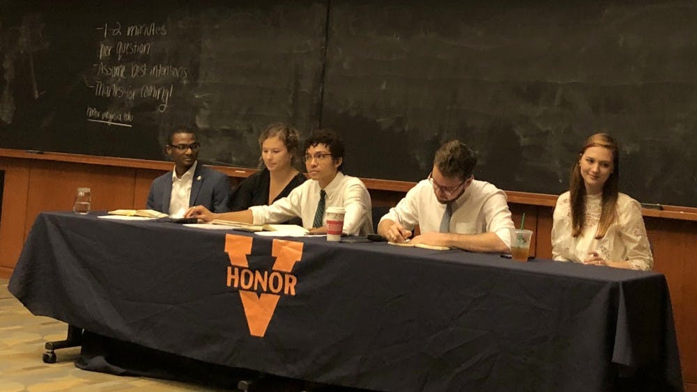 The five-person Honor panel took questions from the audience during Monday night's town hall event.