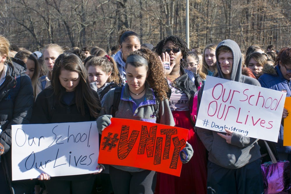 <p>Albemarle High School students walked out to demand change to prevent gun violence after the school shooting in Parkland, Fla.&nbsp;</p>