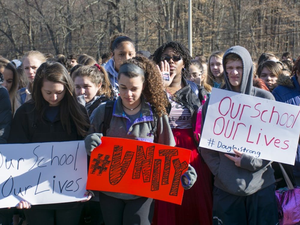 Albemarle High School students walked out to demand change to prevent gun violence after the school shooting in Parkland, Fla.&nbsp;