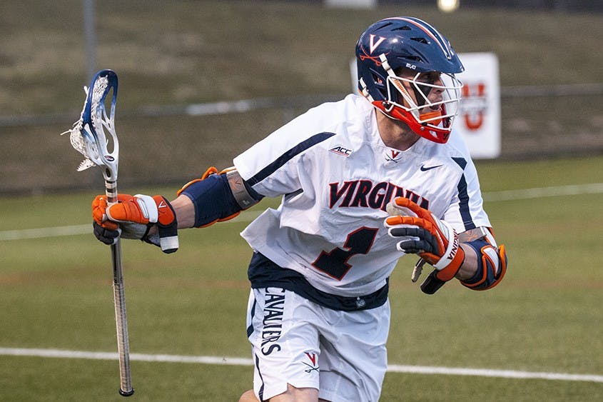 Senior midfielder Greg Cohalan's third goal Sunday sent the Cavaliers to overtime against No. 8 Johns Hopkins. Led by its co-captain Cohalan, a tough Virginia team edged the Blue Jays, 13-12. 