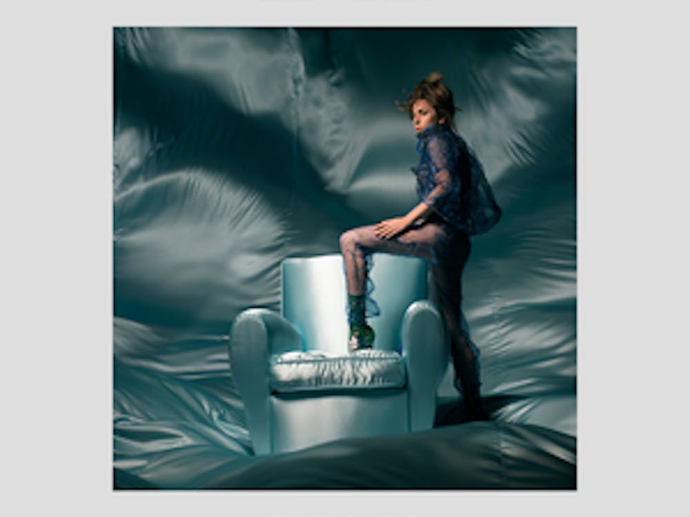 The surprise single presents a tamer version of the often larger than life artist.