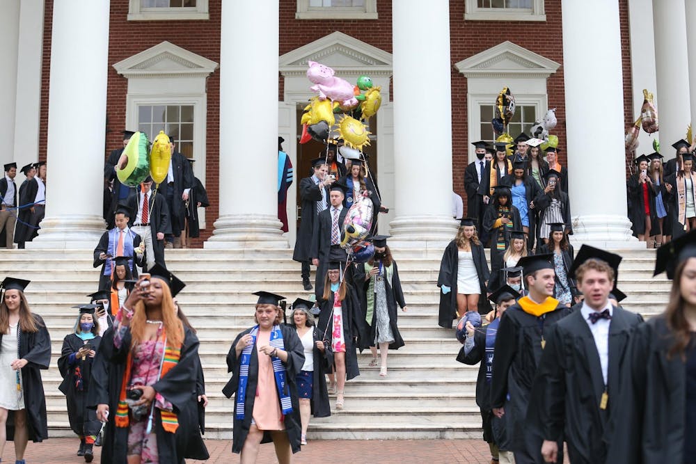 The ceremony began with the traditional academic procession from the Lawn to Scott Stadium. 