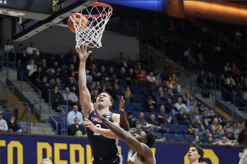 <p>Elijah Saunders attempts a layup.</p>