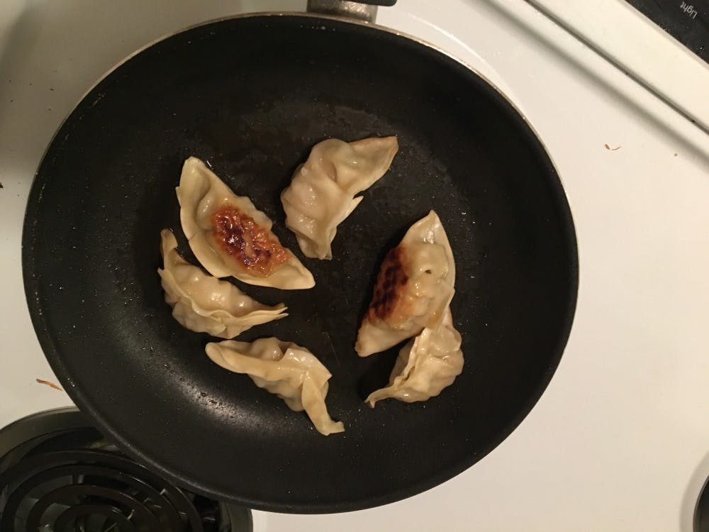 Pan fried potstickers often turn out better than those that are microwaved.&nbsp;