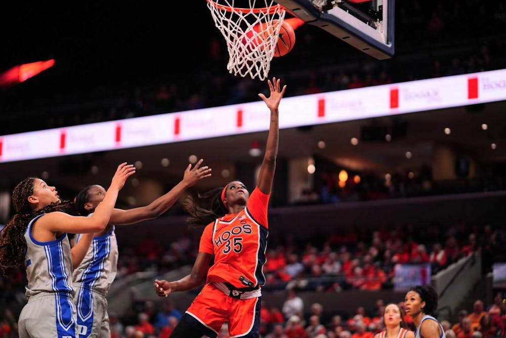 <p>Senior forward Latasha Lattimore powers her way to the rim.</p>