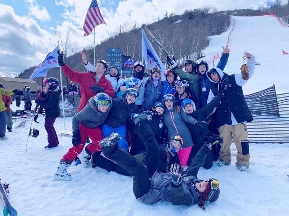 <p>VASST celebrates after a successful outing at nationals — both on and off the slopes.&nbsp;</p>