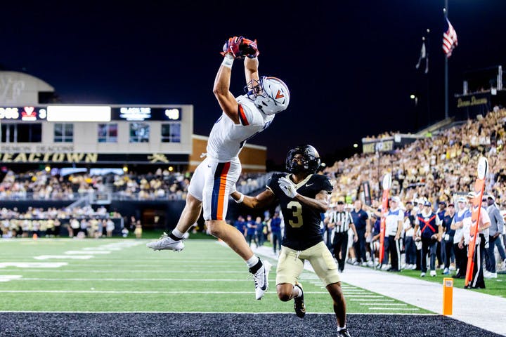 Graduate tight end Tyler Neville leaps for a touchdown grab in the second quarter.