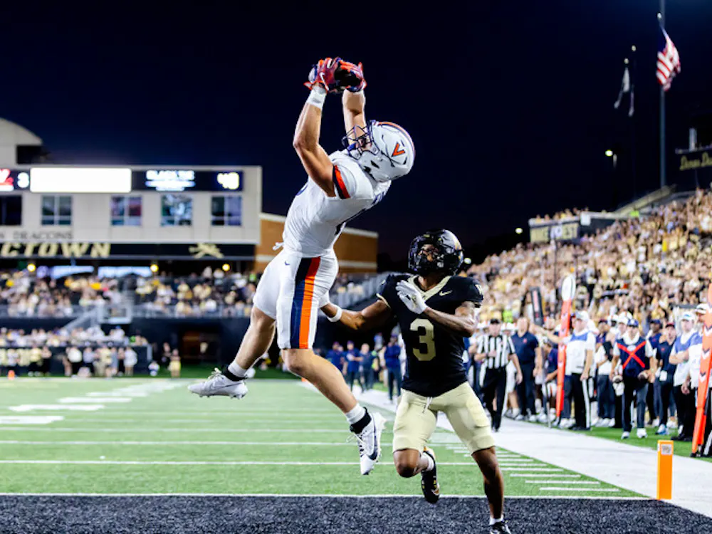 Graduate tight end Tyler Neville leaps for a touchdown grab in the second quarter.