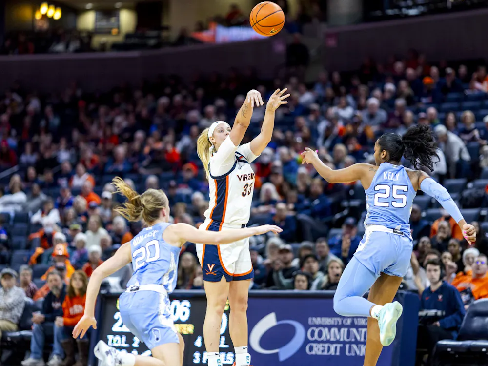 Sam Brunelle fires a three-point shot against North Carolina.