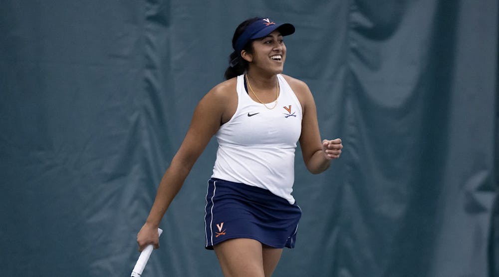 <p>Senior Natasha Subhash clinched victory for the Cavaliers with a three-set win to close out the match.</p>