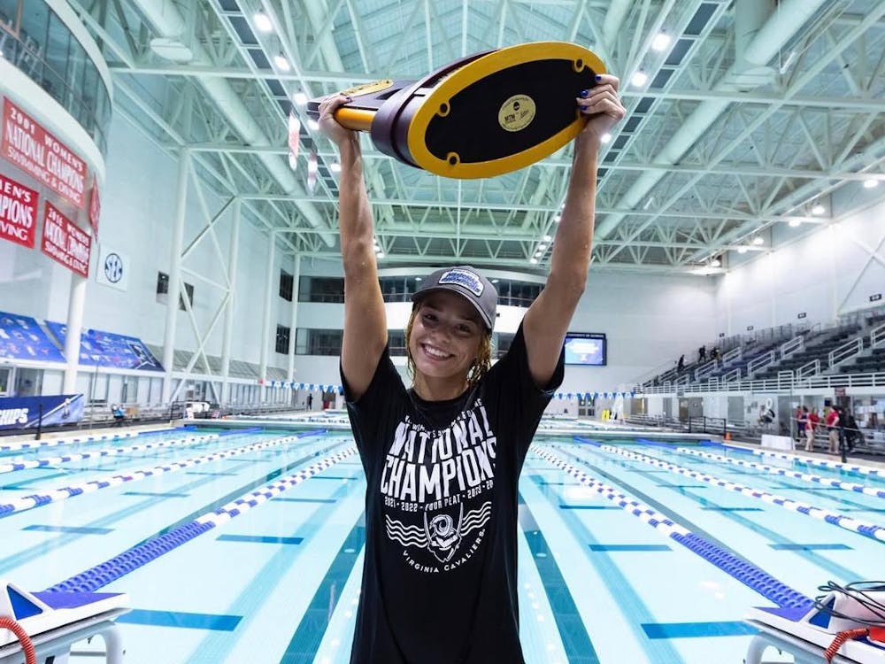 Kaye hoists the 2024 National Championship trophy.