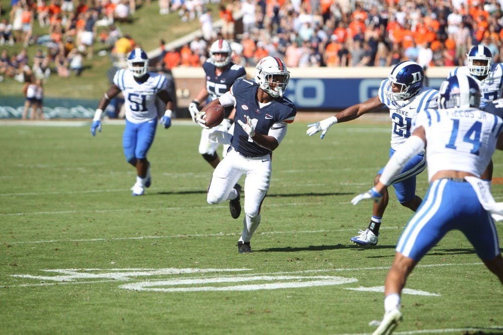 Former Virginia tailback Jordan Ellis signed with the Cincinnati Bengals Saturday night as an undrafted free agent.