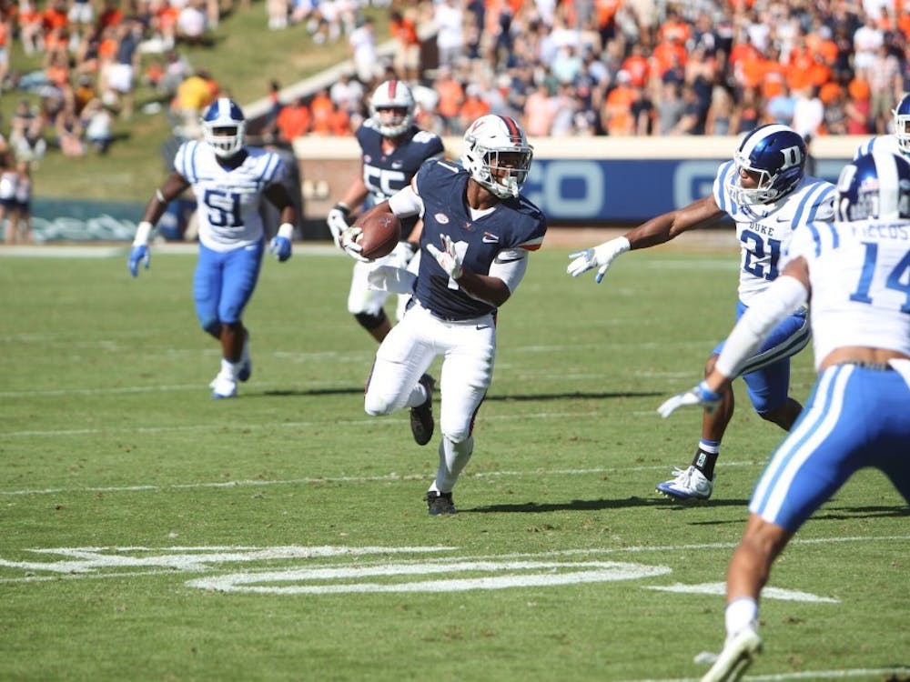 Former Virginia tailback Jordan Ellis signed with the Cincinnati Bengals Saturday night as an undrafted free agent.