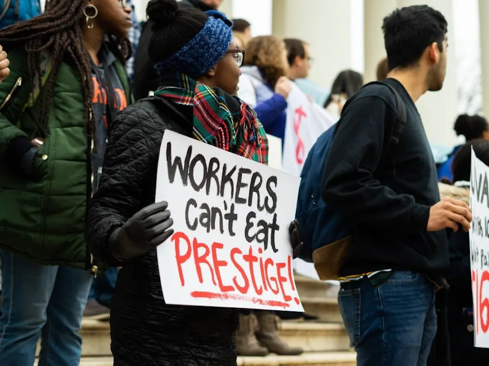 The Living Wage Campaign held a rally outside of a Board of Visitors meeting last March to encourage a raise for University faculty and staff.