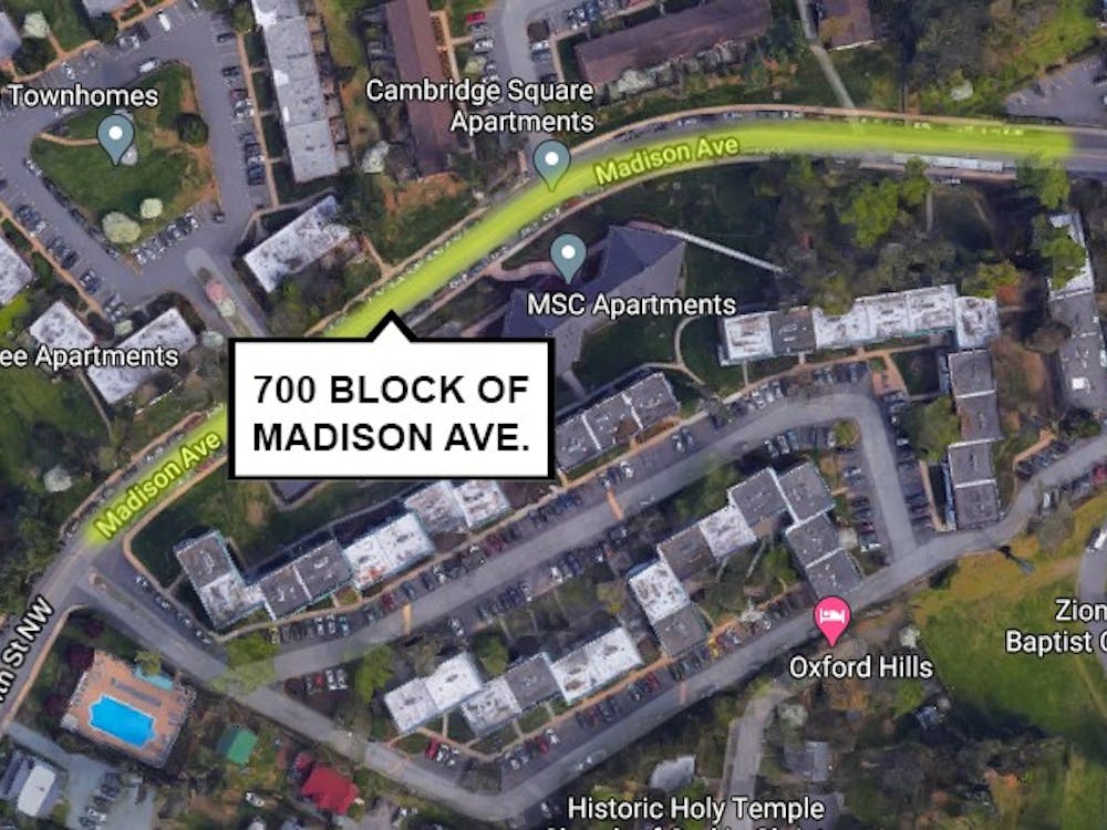 A man abducted at gunpoint a woman walking on the 700 block of Madison Avenue at approximately 10:15 p.m. Thursday, near several apartment complexes popular among University students.