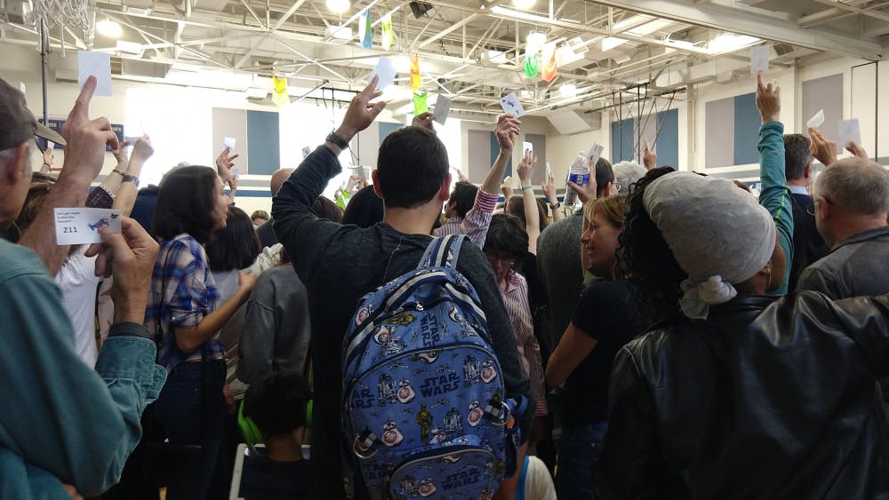 The caucus itself took place in the gymnasium of the middle school. At final tally, there were 752 voters present.