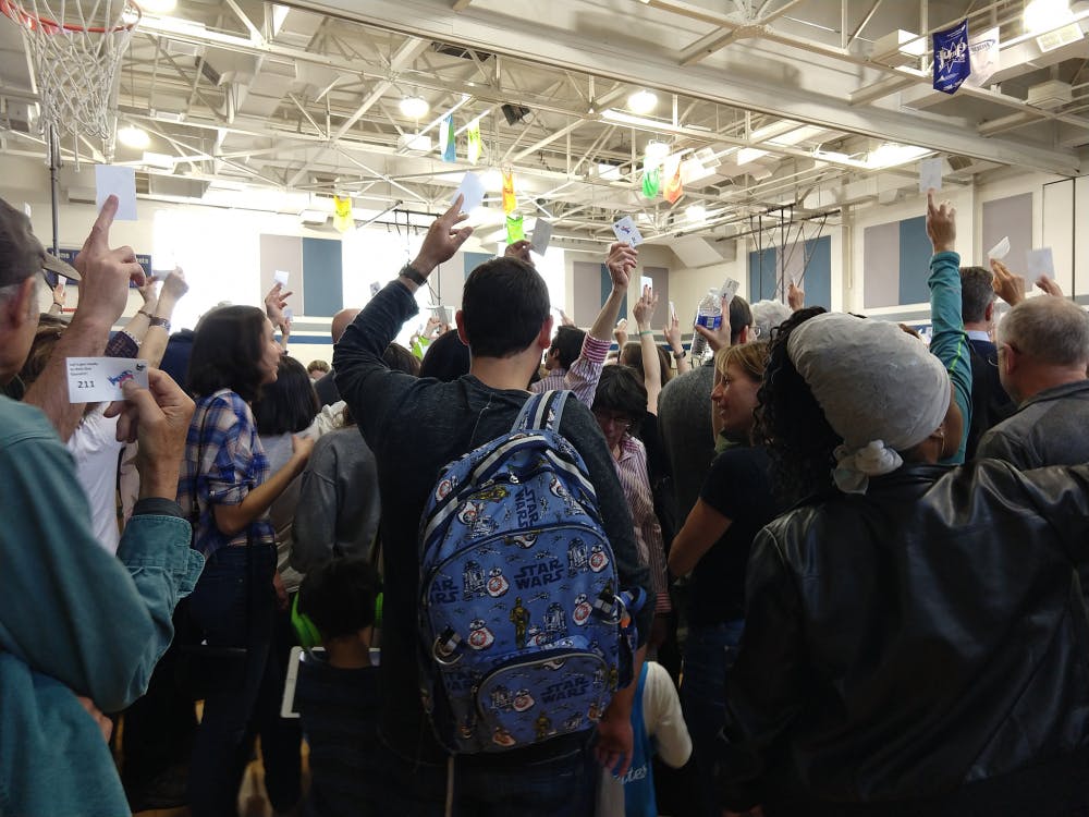 The caucus itself took place in the gymnasium of the middle school. At final tally, there were 752 voters present.