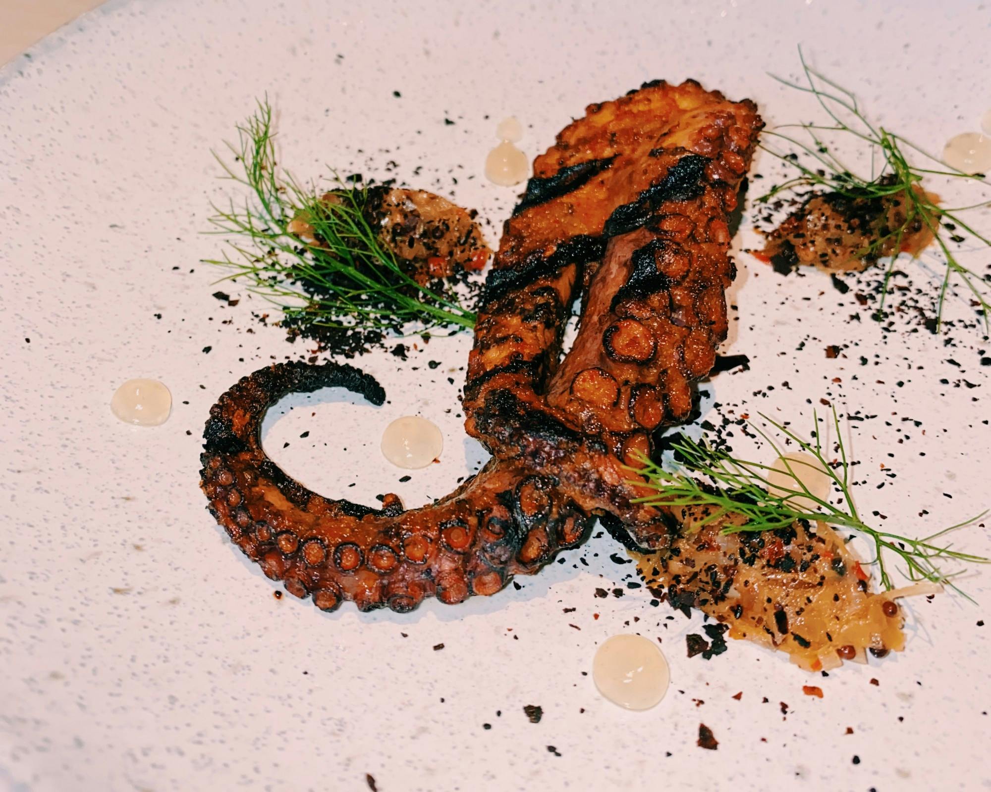 The charred octopus came with two tentacles and was complimented with melted leeks, sour chili paste and little drops of preserved lime. 