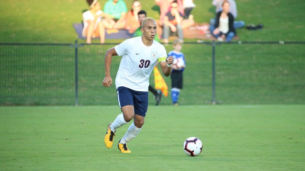 <p>Virginia junior midfielder Robin Afamefuna helped give the Cavaliers a 2-1 lead with his goal in the second half against Clemson Friday night.</p>